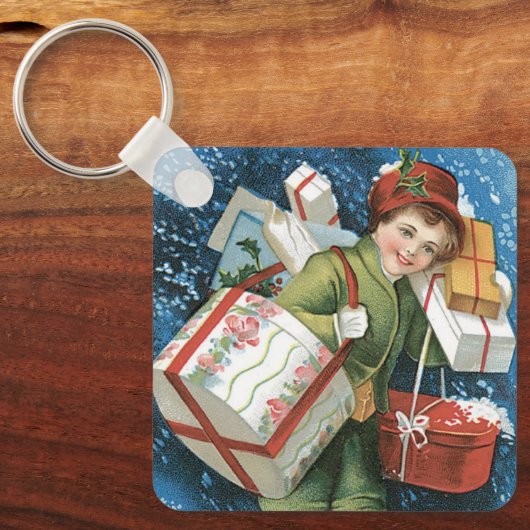 冬の雪に贈り物を贈るヴィンテージクリスマス キーホルダー (正面)