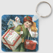 冬の雪に贈り物を贈るヴィンテージクリスマス キーホルダー (裏面)