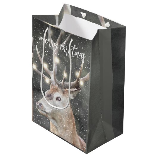 冬の雪のトナカイのメリークリスマス ミディアムペーパーバッグ (正面アングル)