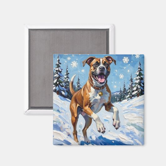 冬の雪の中で躍動するボクサー犬のエネルギッシュな姿が楽しい マグネット (正面/裏面)