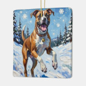 冬の雪の中で躍動するボクサー犬の元気な姿 セラミックオーナメント (左)