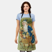 冬の雪の中で鹿とクリスマスプレゼントを持つサンタ エプロン (着用した状態)