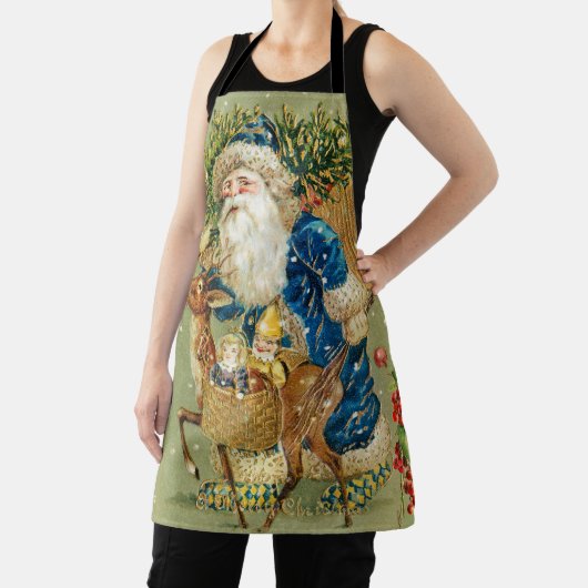 冬の雪の中で鹿とクリスマスプレゼントを持つサンタ エプロン (インサイチュ)