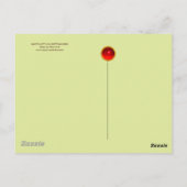 冬の雪の中で鹿とクリスマスプレゼントを持つサンタ ポストカード (裏面)