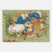 冬の雪の中で鹿とクリスマスプレゼントを持つサンタ ラッピングペーパーシート (正面3)