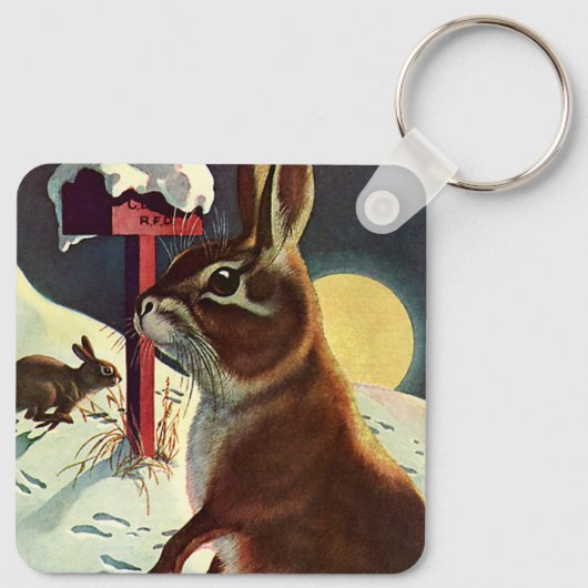 冬の雪の中のウサギたち キーホルダー (裏面)