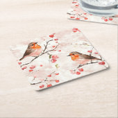 冬の雪の木と果実の水色フィンチ スクエアペーパーコースター (アングル)