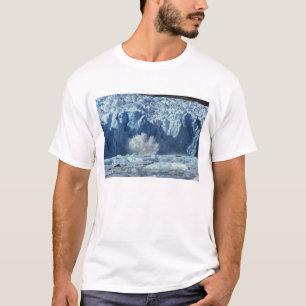 冷たい水に飛び込む新しく分離した氷山 Tシャツ