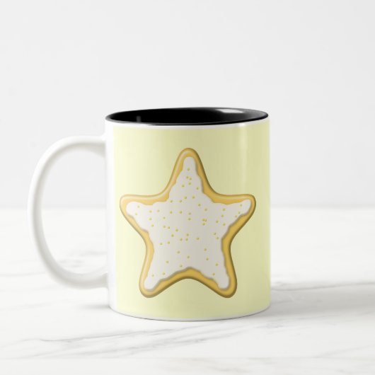 凍らされた星のクッキー。 黄色およびクリーム ツートーンマグカップ (左)