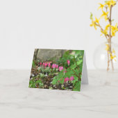 出血ハートが茎からぶら下がっている カード (黄色い花)