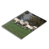 分野で走っているアラビア人 ノートブック (左側)