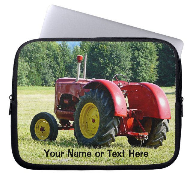 分野の旧式で赤くおよび黄色のトラクター ラップトップスリーブ (正面)