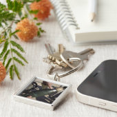 分隊のリーダーが遅延設定を指す キーホルダー (側面)