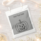 切りおもしろい抜き顔のトリックまたは治療を持つカボチャ フェイバーバッグ (クリップ留めされた状態)