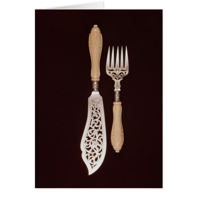 切り分けられたアイボリーのハンドルが付いている魚サーバー (正面)