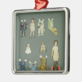 切り取られた人形および衣服の遅い20年代早の30年代 メタルオーナメント (左)