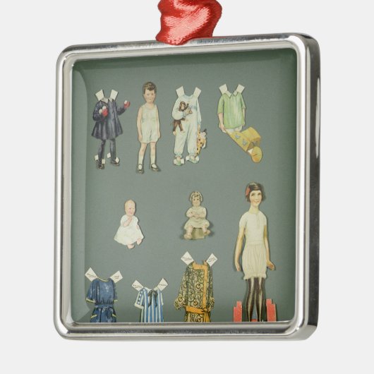 切り取られた人形および衣服の遅い20年代早の30年代 メタルオーナメント (左)