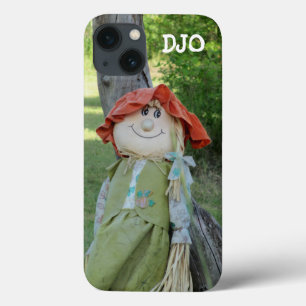 切り株に寄り掛かる田舎娘のかかし iPhone 13ケース