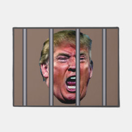 刑務所のバーの後ろで泣き叫ぶトランプの頭 ドアマット
