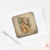 列車の駅で子どもとクリスマスを過ごす父 スクエアシール (封筒)