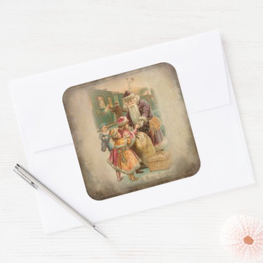 列車の駅で子どもとクリスマスを過ごす父 スクエアシール (封筒)