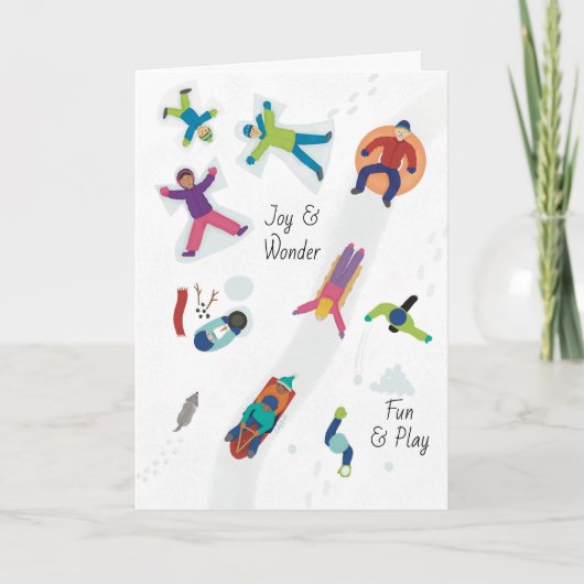 初雪の冬の子供たち 雪の天使を作って遊ぶ シーズンカード (正面)