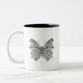 刺激を受けたな熱帯蝶 ツートーンマグカップ (左)