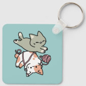 前足で遊ぶ猫のかわいいイラスト キーホルダー (裏面)