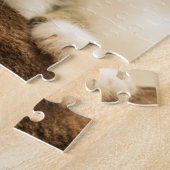 前足を伸ばした可愛い子猫 ジグソーパズル (側面)