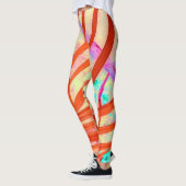 前面が赤に変わる レギンス (左)