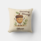 力強く成長する愛らしい笑顔のどんぐり クッション (正面)