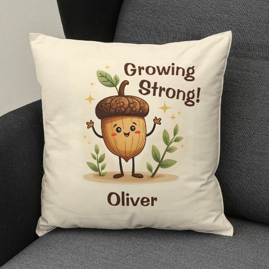 力強く成長する愛らしい笑顔のどんぐり クッション