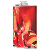 動きをシミュレートするスクラッチされた赤いリボン フラスク (左)