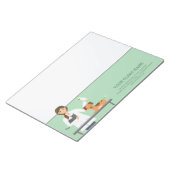 動物とビジネス情報を持つ獣医の女性 ノートパッド (アングル)