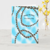 包まれた真珠の誕生日 カード (黄色い花)