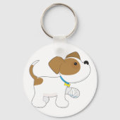 包帯を巻いた足の子犬 キーホルダー (裏面)