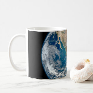 北アメリカとメキシコを示す完全な地球。 コーヒーマグカップ