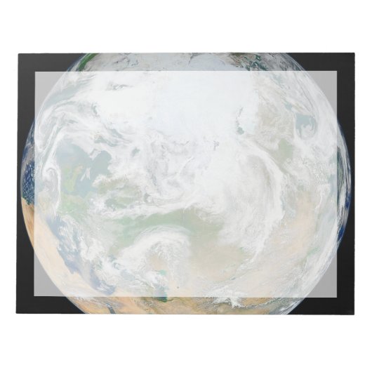 北極圏、ヨーロッパ、アジアを示す地球。 ノートパッド (正面)