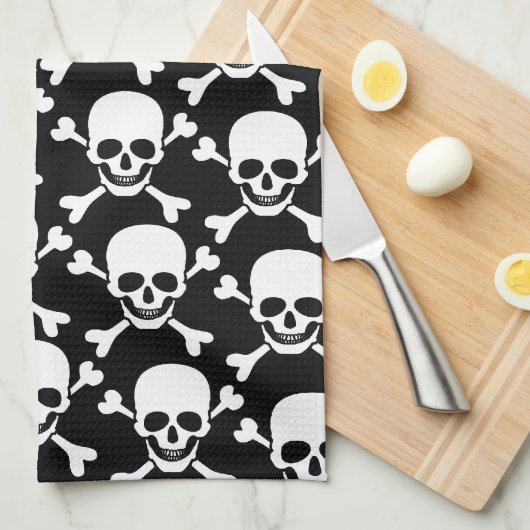 十字が付いているスカルは黒い背景のスカルの骨を抜きます キッチンタオル (四つ折り)