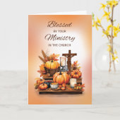 十字架かぼちゃを持つカトリック司祭の感謝祭 カード (黄色い花)