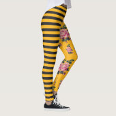 半々のストライプのばら色の花の黒および金ゴールド レギンス (右)