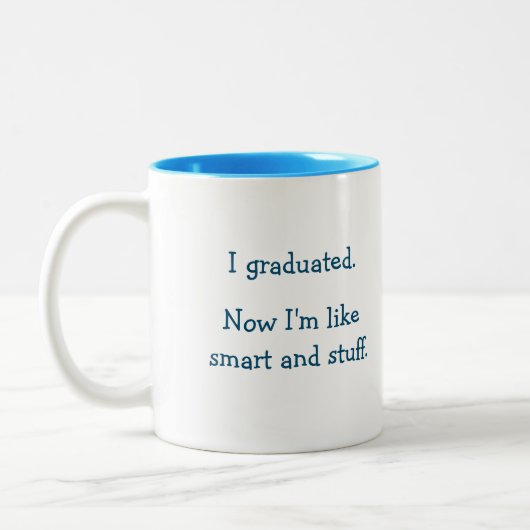 卒業おもしろい引用文ユーモア頭が切れる大学院卒業 ツートーンマグカップ (左)