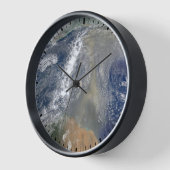 南アメリカに向かう塵 壁時計 (傾斜)