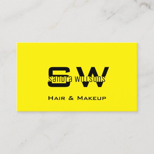 印象的なプレーン黄色と黒カッコいいモノグラム 名刺 (正面)