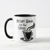 即刻の人間はちょうどコーヒーを加えます マグカップ (左)