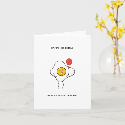 卵液を入れた誕生日カードを持つ カード (黄色い花)