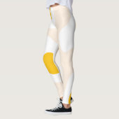 卵 レギンス (左)