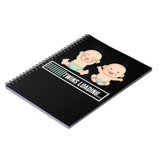 双子の妊娠の発表 ノートブック (左側)