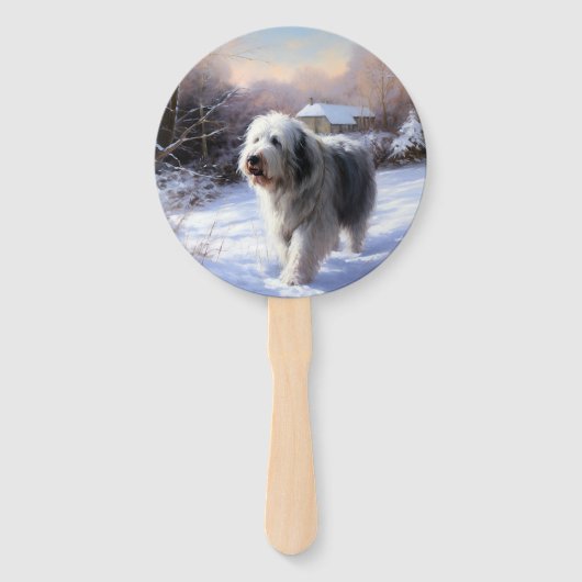 古いイギリスの牧羊犬が雪のクリスマスを過ごした ハンドファン (正面)