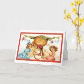 古いファッションドハロウィーン、カボチャの女の子 カード (黄色い花)